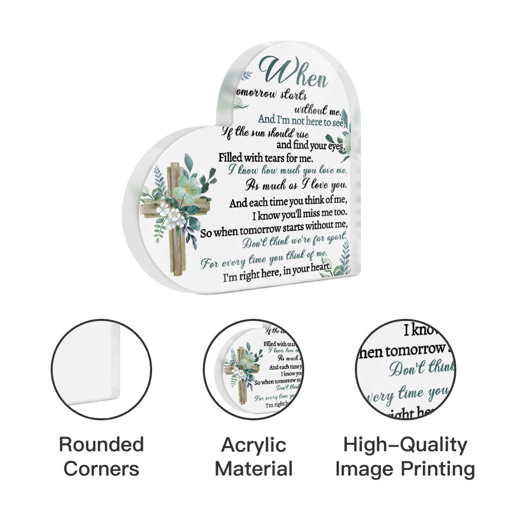 Decorative plaque with floral design and text on a white background